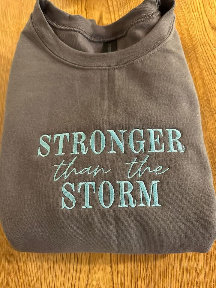 Stronger Than The Storm Crewneck